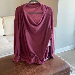 Free People large pinkish/purple sweater.
